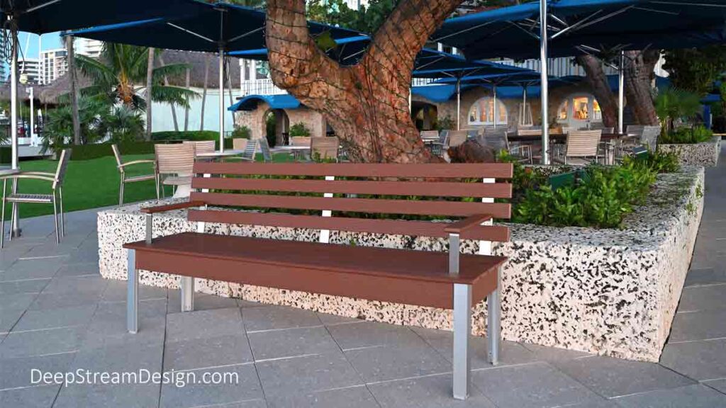 Perfect outdoor bench with ergonomic back and arms.